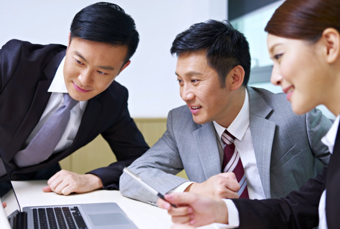 Insurance professionals collaborating